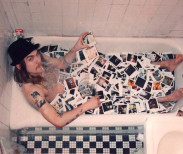 Dave Schubert, Dash Snow in the Bathtub, 2013. Enlarged C-print. Image courtesy of Rox Gallery.