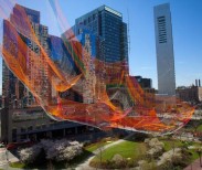 The vast net of rusty orange, magenta, and green hues will float above the Greenway until October. Dina Rudick/Globe Staff