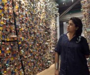 Indian artist Hema Upadhyay poses in front of her "Think Left, Think Right, Think Low, Think Tight" installation at the Paris's Pompidou Centre on May 23, 2011.