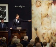 Andy Warhol's “Four Marilyns (Reversal Series)” (1979-86) and Jenny Saville's “Shift” (1966-67) are auctioned off at Sotheby's Contemporary Art Evening Sale, June 28, 2016.
(Courtesy of Sotheby's )